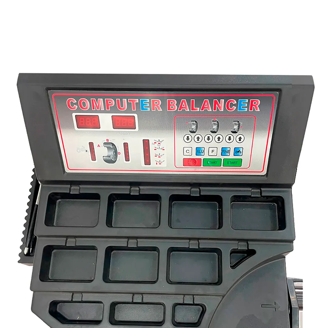 Painel de controle e porta-chumbos da balanceadora