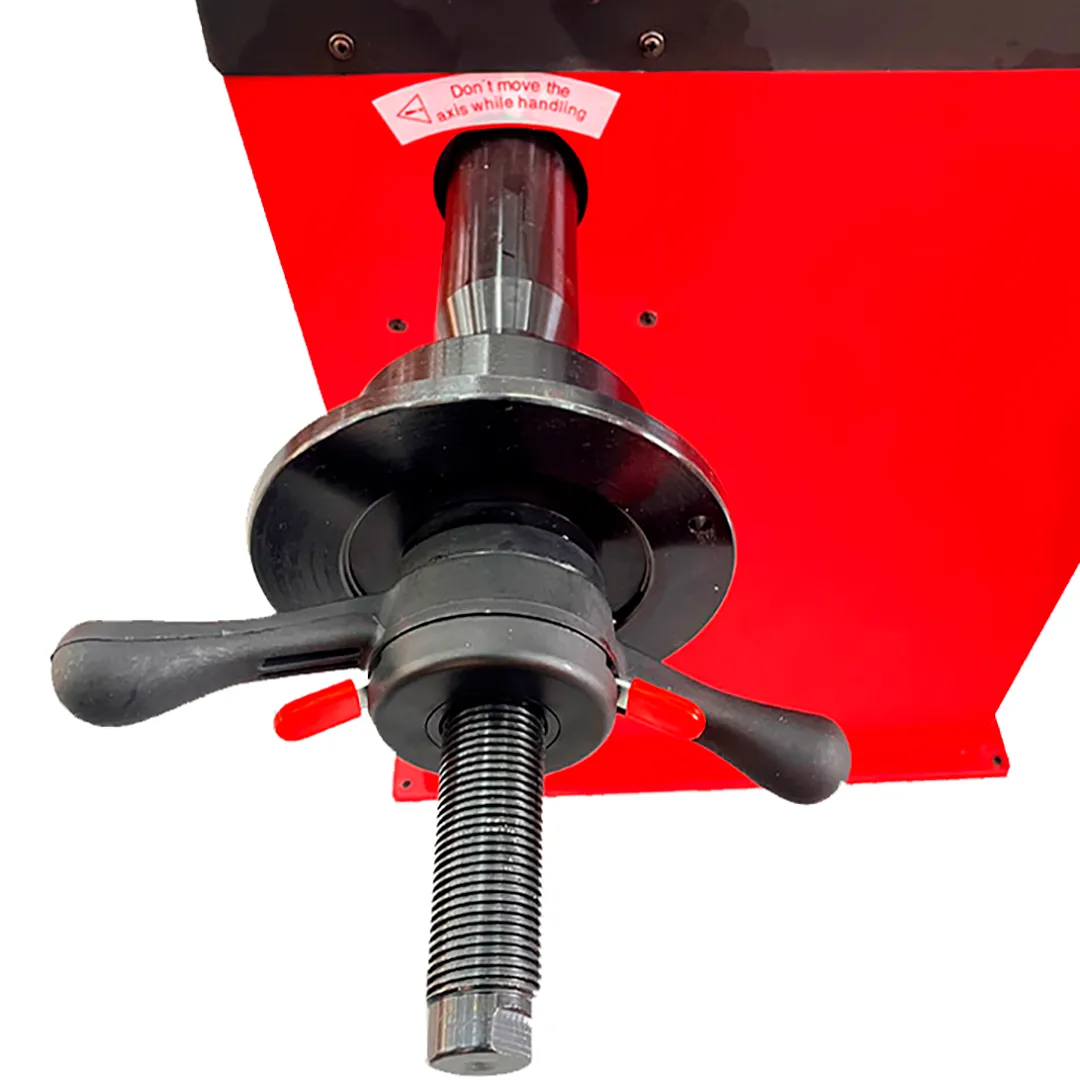 Detalhe do eixo e da porca rápida da balanceadora